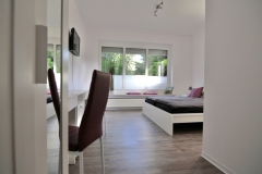 Schlafzimmer - Ferienwohnung Krabbe